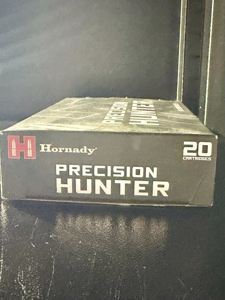 Various empty cardboard ammo boxes.