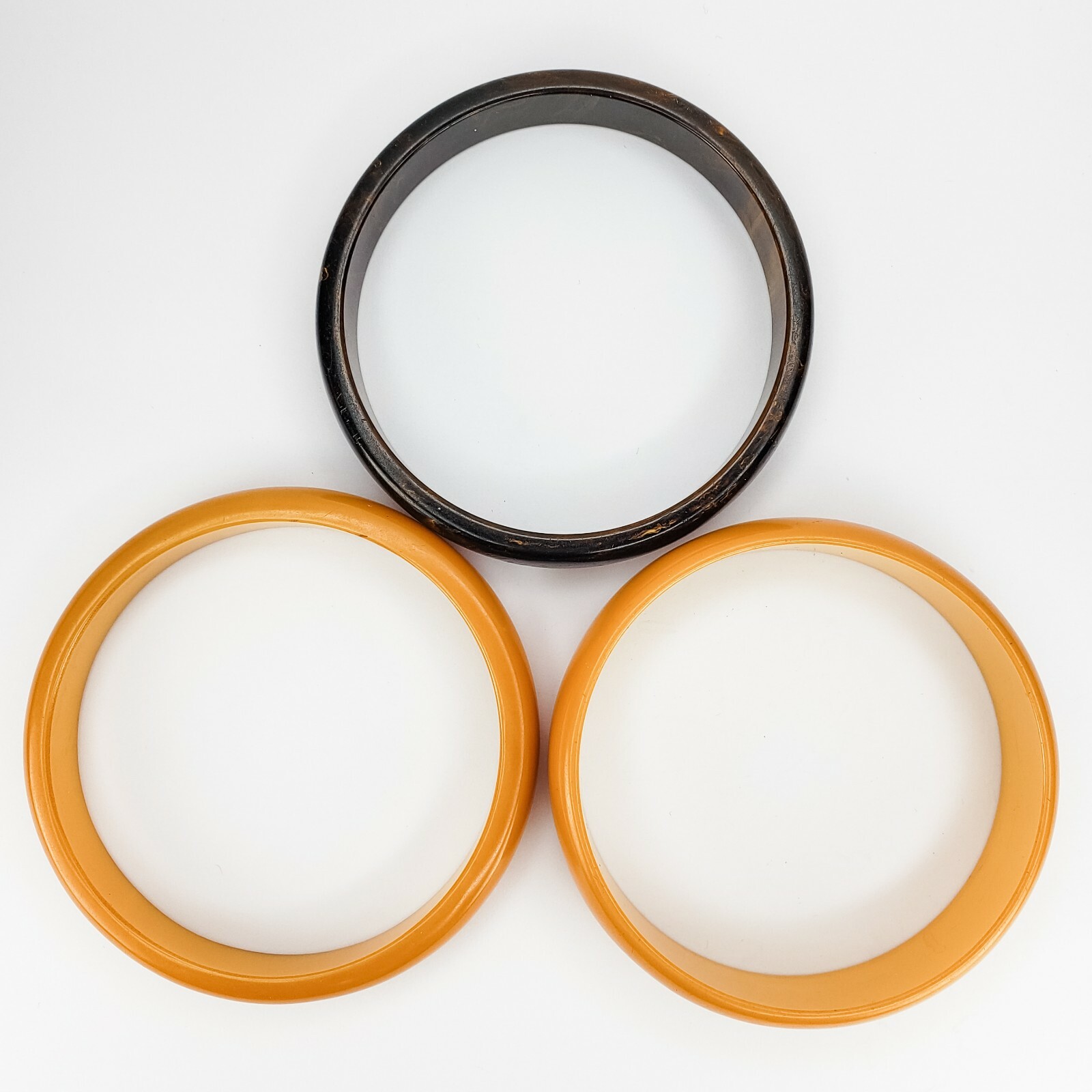 Set of 3 Two Butterscotch Yellow and One Brown Swirled Bakelite Bangle Bracelets