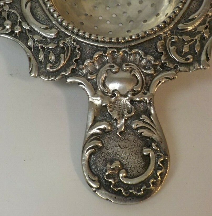 Continental .800 Silver Tea Strainer, Repousse Design, c. 1900, 58 grams