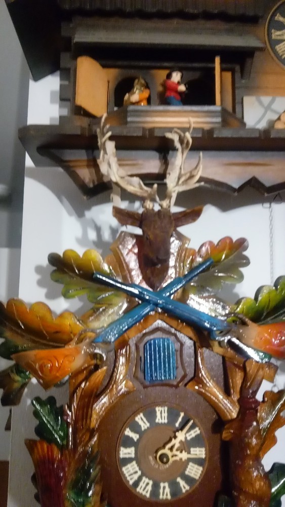 Blackforest Blue Guns Cuckoo Clock Eight Day.