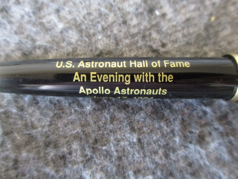 NASA APOLLO ASTRONAUT INDUCTION PROGRAM SIGNED BY WALTER M. SCHIRRA + PEN