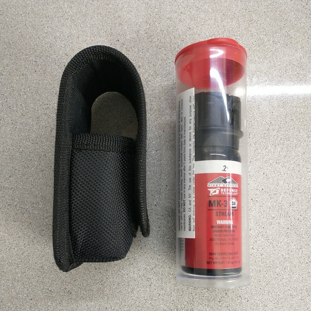 One (1) Defense Technology OC Stream MK-3 .2% Solution w/ Ballistic Nylon Holder