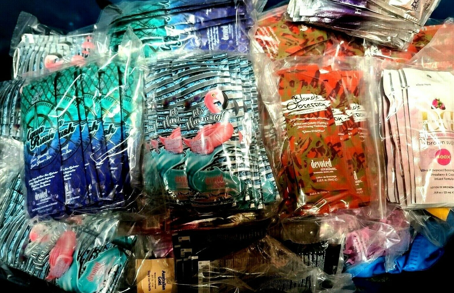 50 Brand New Salon MYSTERY Packets of Indoor Tan Tanning Bed Lotion & Bronzers