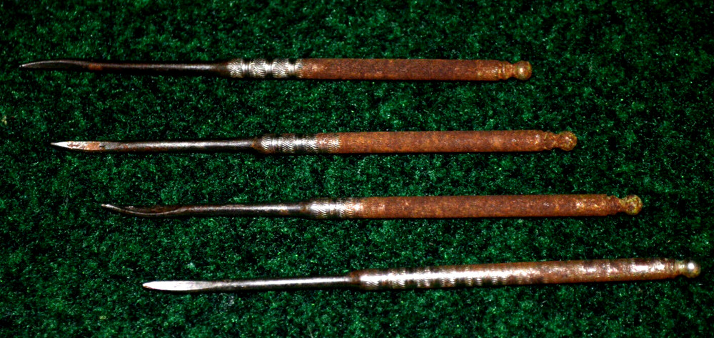 Four Vintage Nut Picks