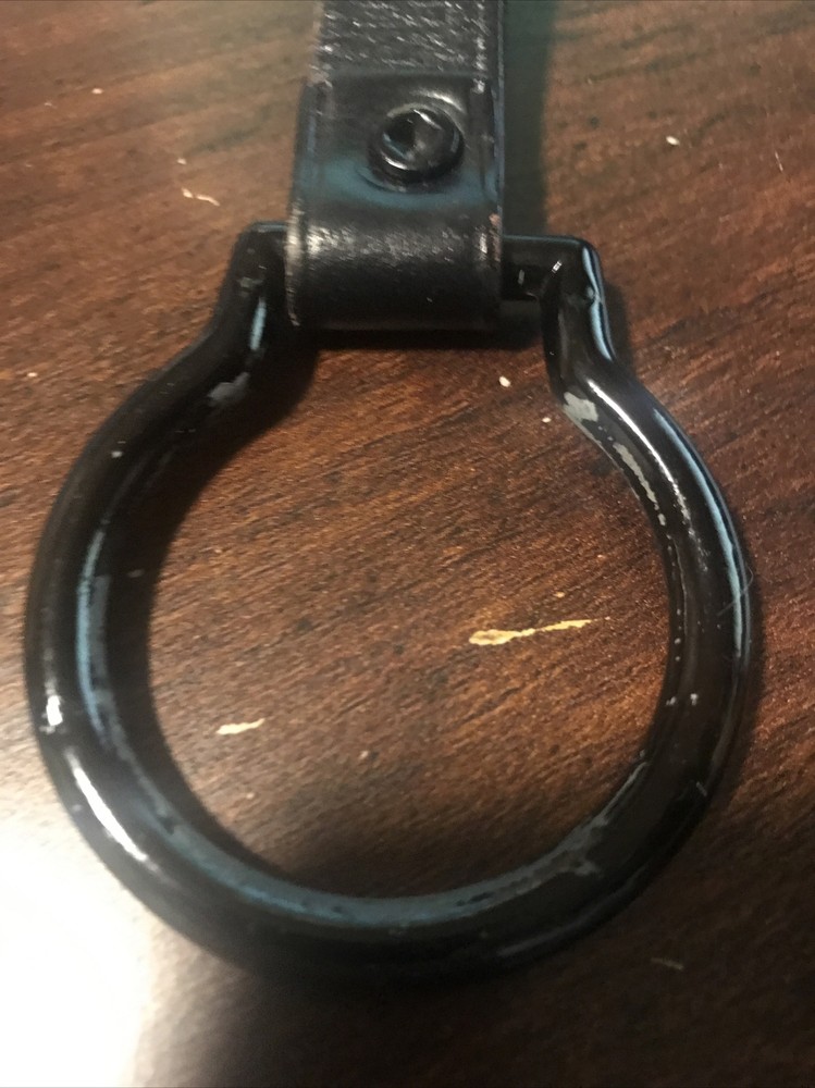 Flashlight holder for belts