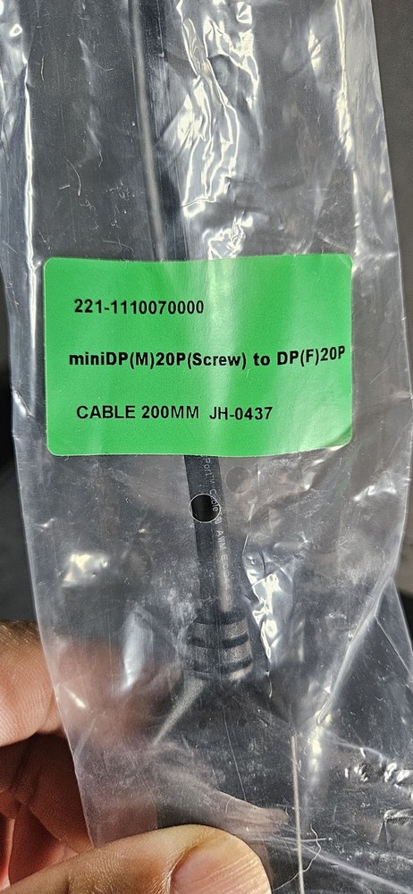 Mini DisplayPort to DisplayPort cable.
