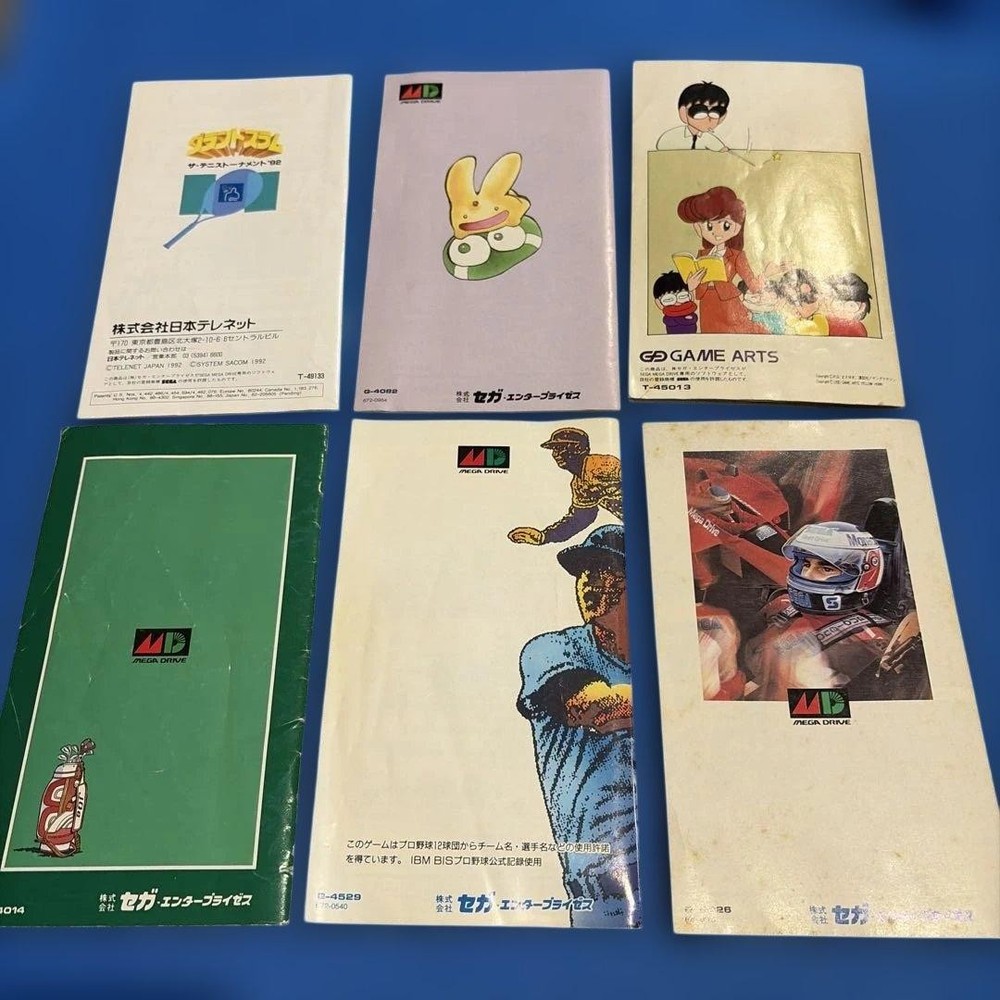 Set of 6 manuals for Mega Drive software (in poor condition)