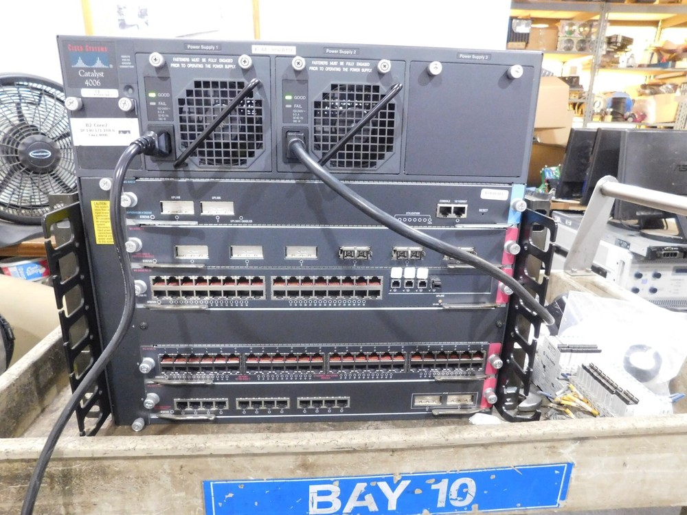 Cisco Catalyst WS-C4006 Switch. See full description for installed Modules:
