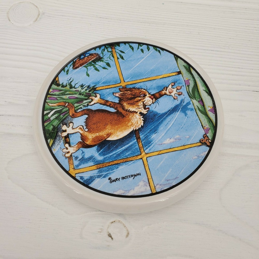 Gary Patterson Cat Swinging on Curtains Ceramic Coaster