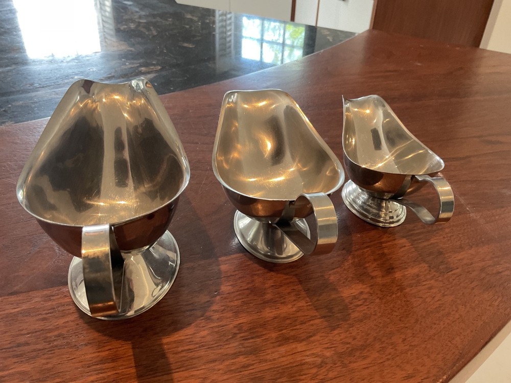 THREE SILVER COLOUR SAUCE BOATS GRADUATED