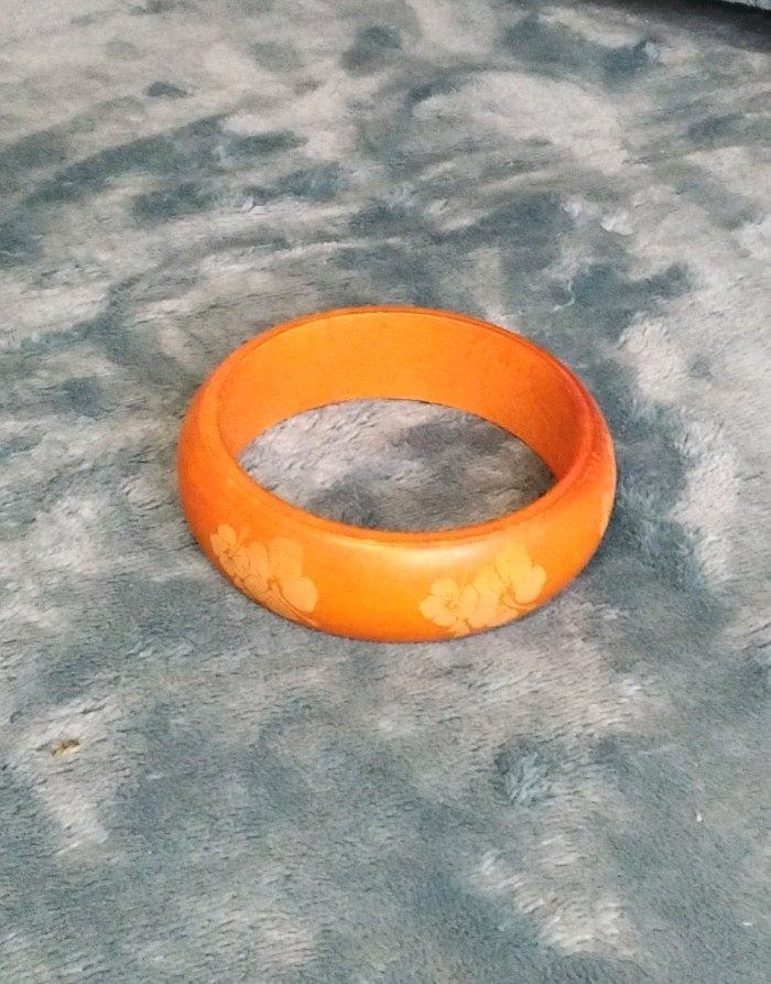 Bakelite Orange Bangle Bracelet with Floral Pattern, Vintage 3 Inch Diameter