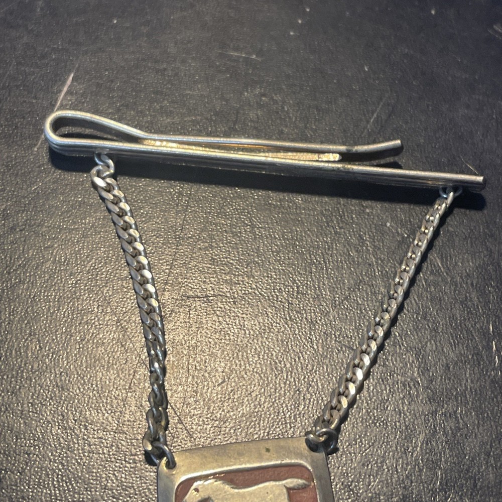 Silvertone clip with horse charm