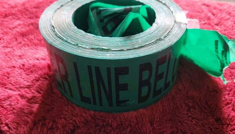 Partial Roll Sewer Line Below Caution Tape 3 Inch Green