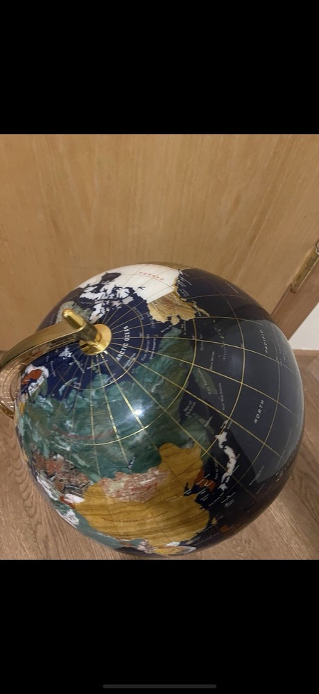 Blue lapis gemstone world map globe