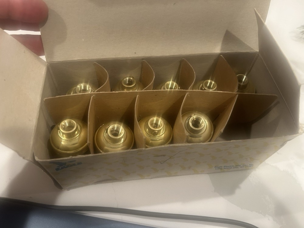 9 NOS 1/8” CAP EAGLE BRASS DIPPED SOCKETS.