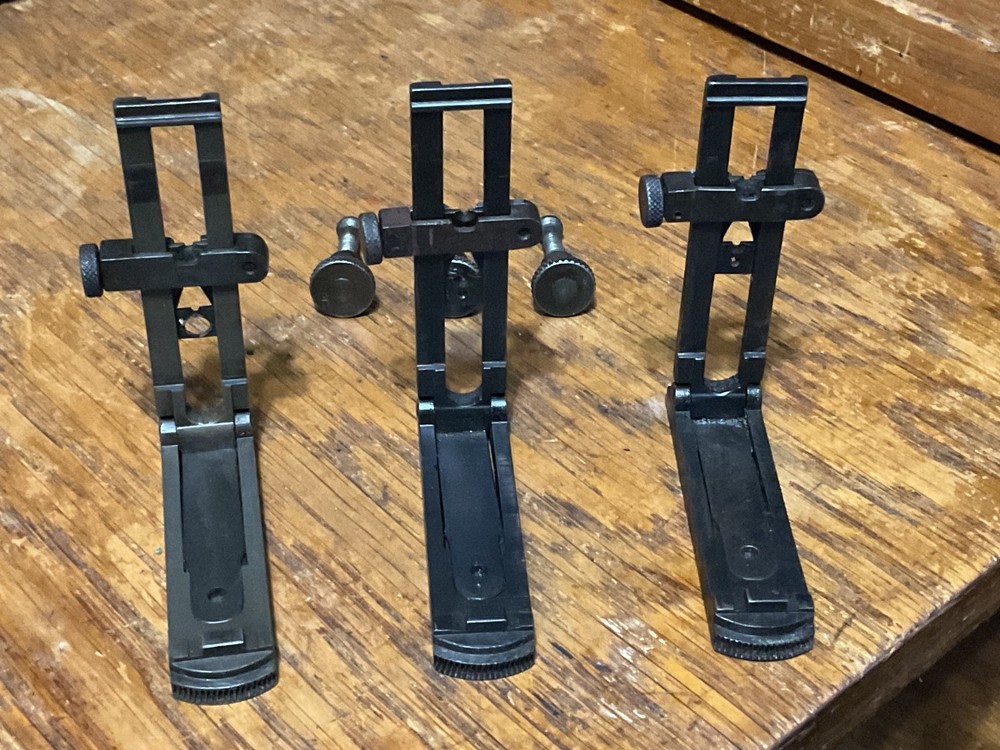 Remington 1903 sight base, leaf, slide, elevation, windage knobs marked R. 1 set