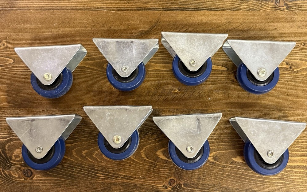 8- 2 7/8 Fixed Blue Casters Pre-owned