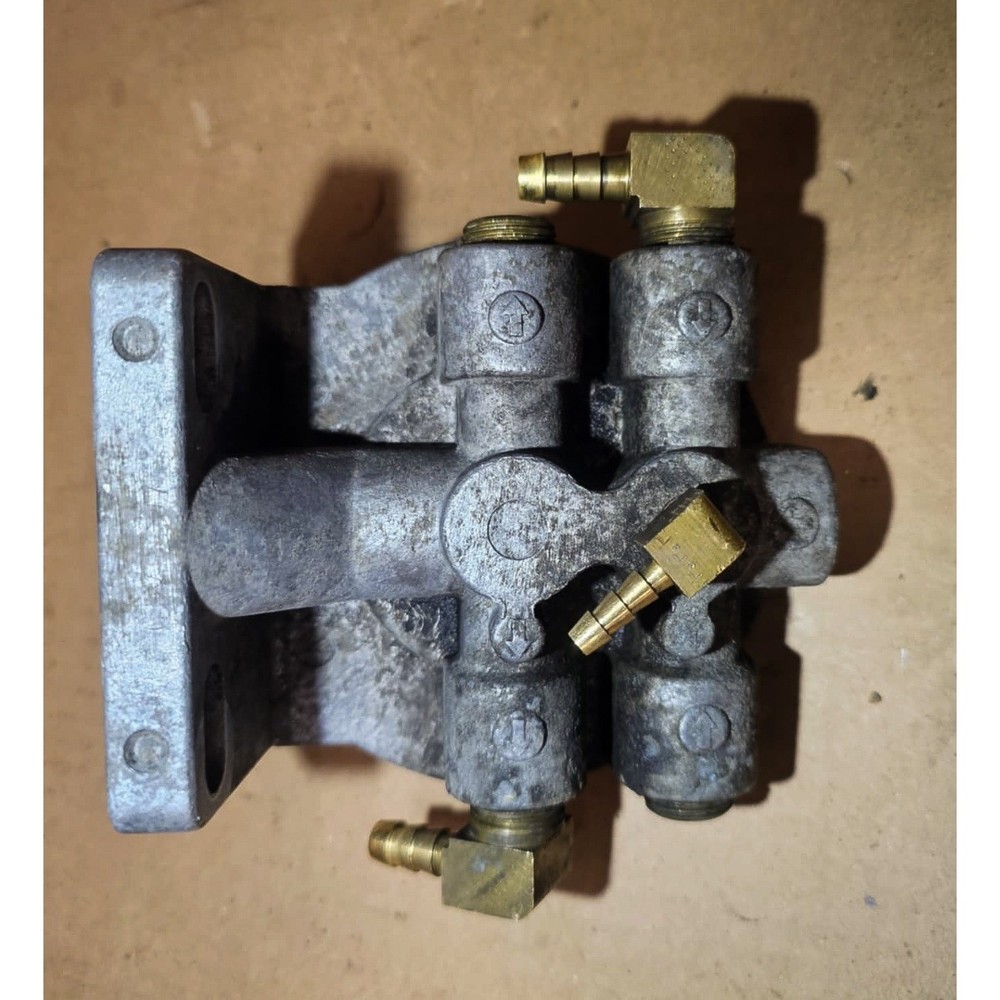 Fuel filter base, 4x 3/8 FNPT barb threads. (324)