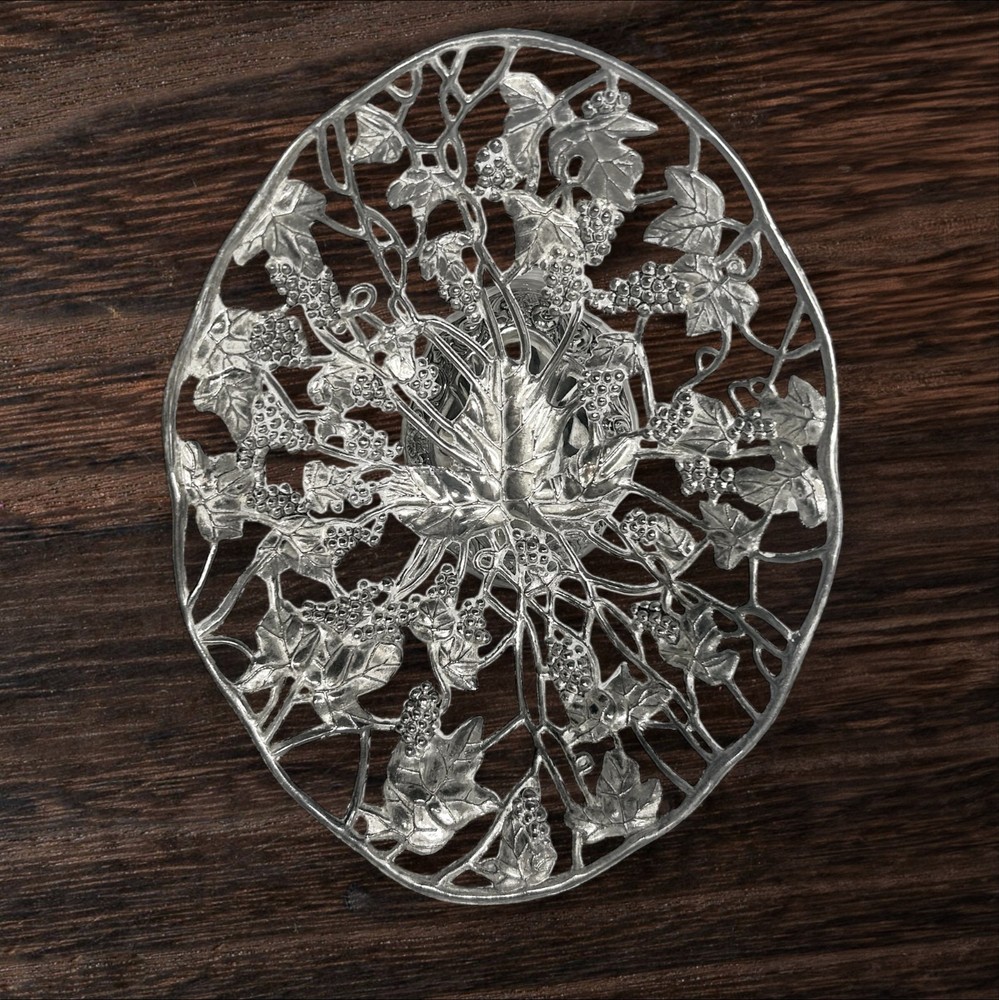 Silver-plated footed centerpiece with intricate grape and vine design