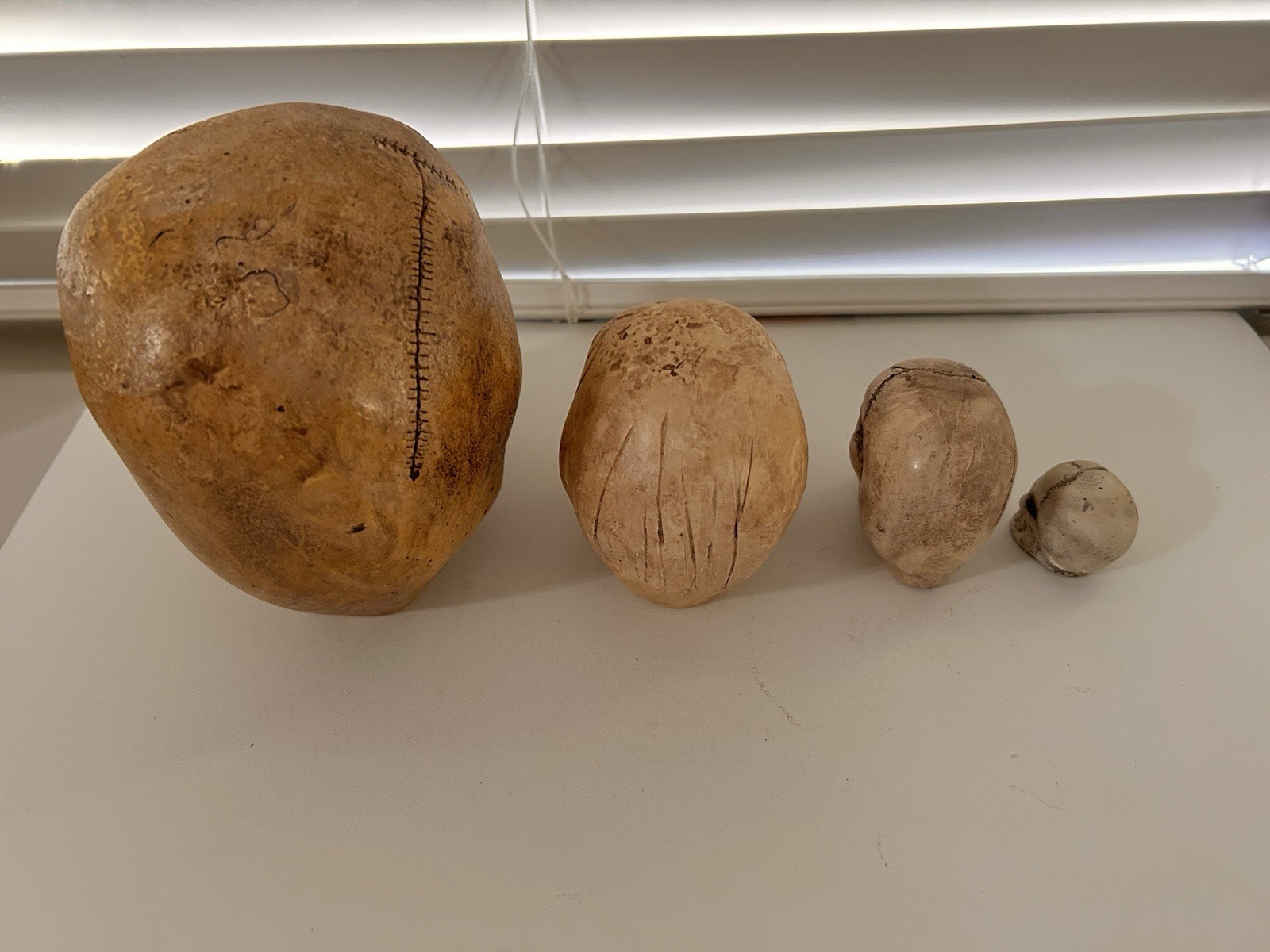 4 EA RANDOTTI ORIGINAL SKULLS LARGE, VOO DOO, PIXIE & SMALL SKULL ALL STILL GLOW