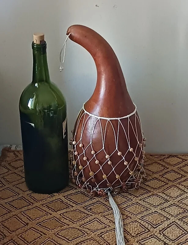 Axatse (medium-small Ewe-style netted gourd rattle)