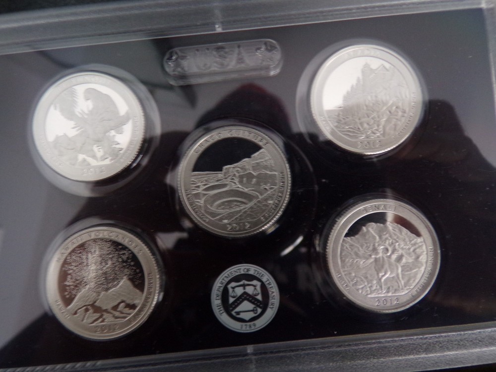 2012 s Silver Proof Set. Penny has nice Red Tint,