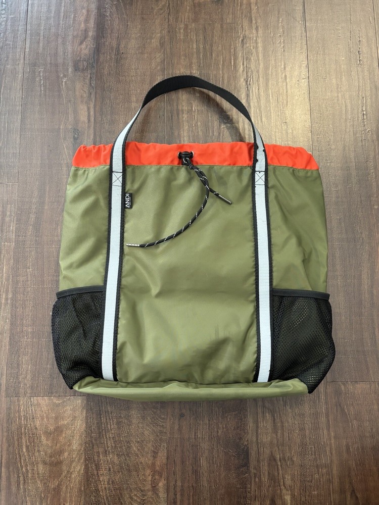 The ANDI Studio Backpack Drawstring Gym Bag Reflective Trim /Olive Green /Orange