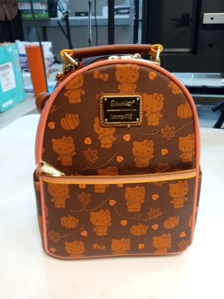 Loungefly x Sanrio Hello Kitty Pumpkin Spice Mini Convertible Backpack