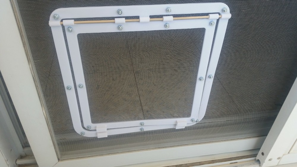 Cat door on mosquito net