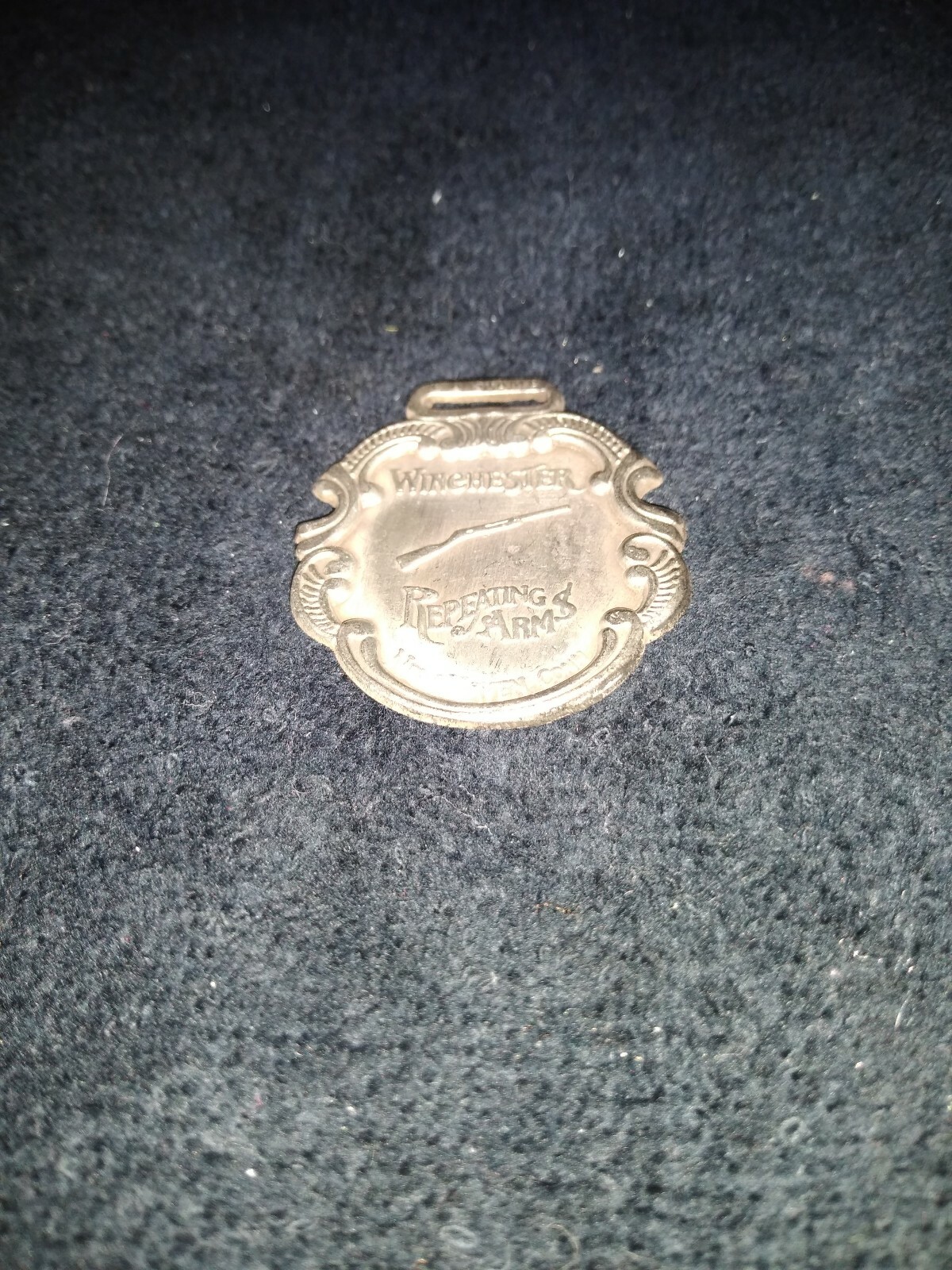 Winchester Repeating Arms Wàtch Fob 2 1/2 x 1 1/2 polished SS Very Nice