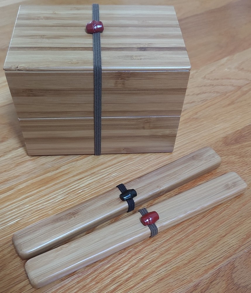 His and hers bento box set with 2 pair matching chopsticks