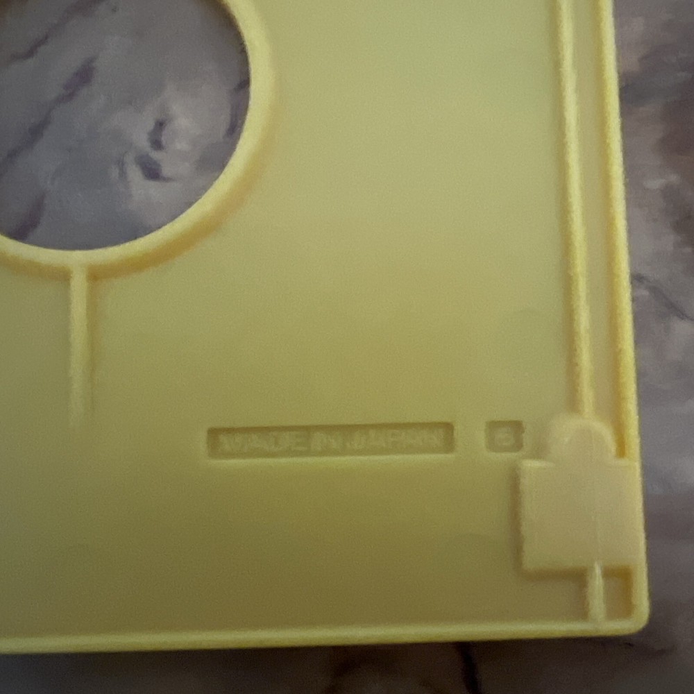 Vintage Apple Macintosh Plus - Yellow Floppy Drive Plastic Protector Disk