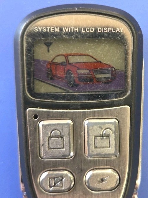 UNBRANDED 4 BUTTON REMOTE TRANSMITTER SYSTEM WITH LCD DISPLAY