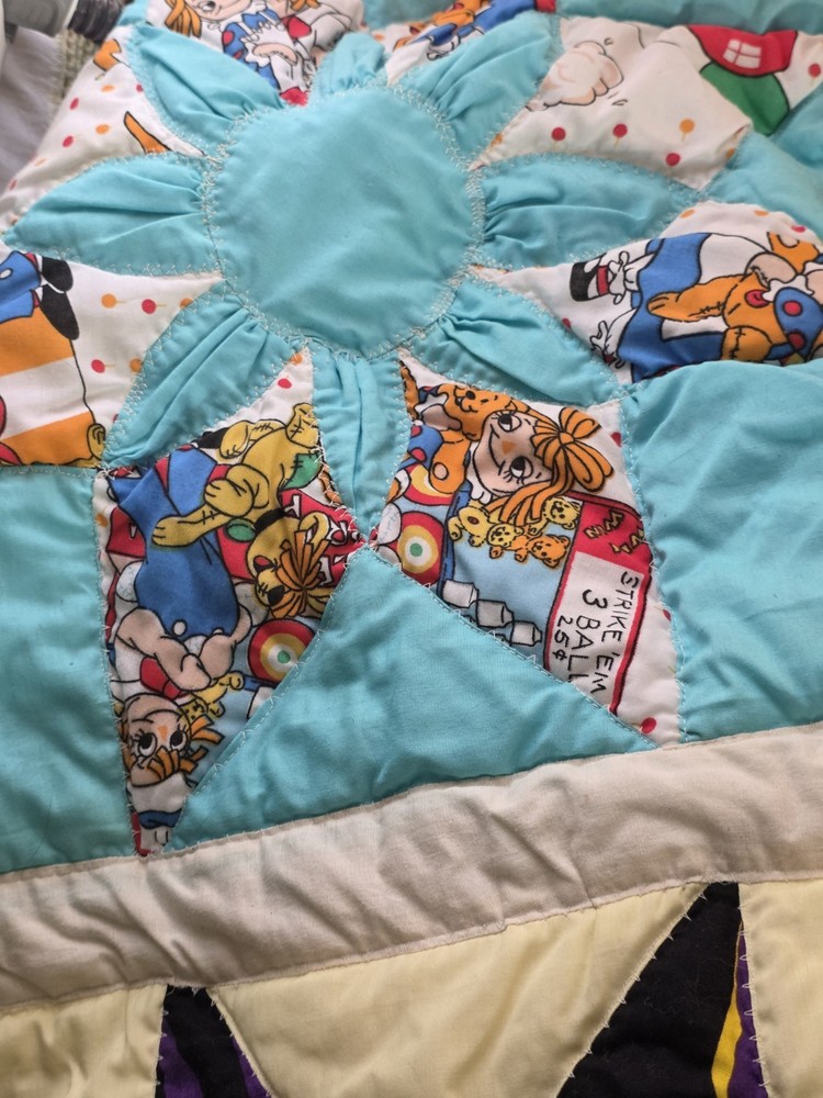 vintage handmade quilt featuring The Sunflower Pattern