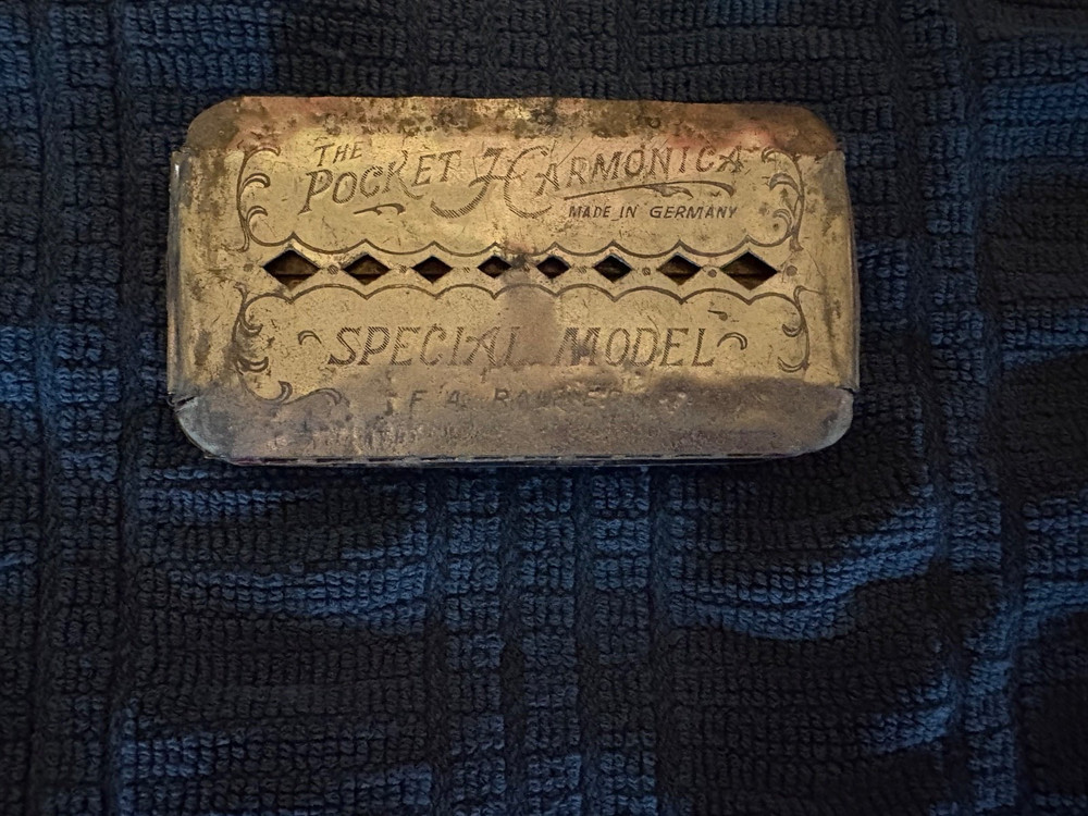 5 vintage Harmonicas. Beautiful instruments