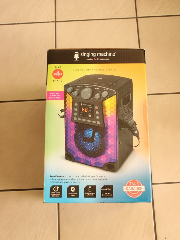 The Singing Machine Bluetooth CD+G Karaoke System, black with microphone