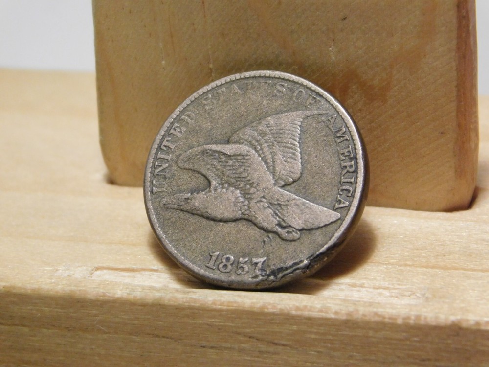 1857 U.S. Flying Eagle cent, lamination error at edge