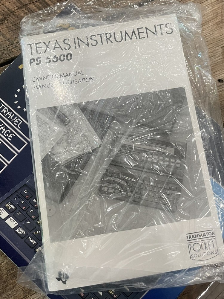 Texas Instruments PS 5600 digital pocket translator 90s. Works