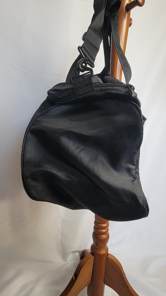 Under Armour duffel bag in black.