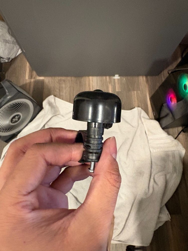 Bicycle handlebar clamp bell
