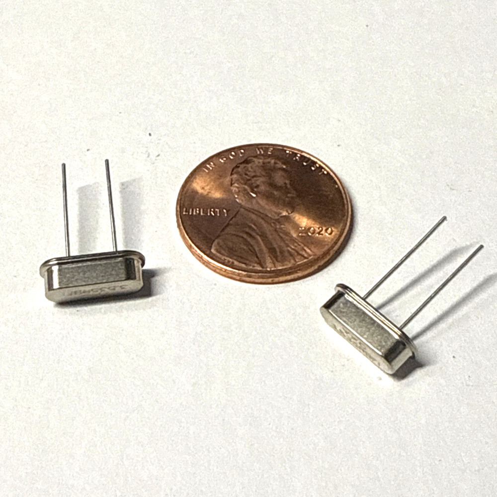 2 pcs 7.035 MHz Crystal. HC49/S