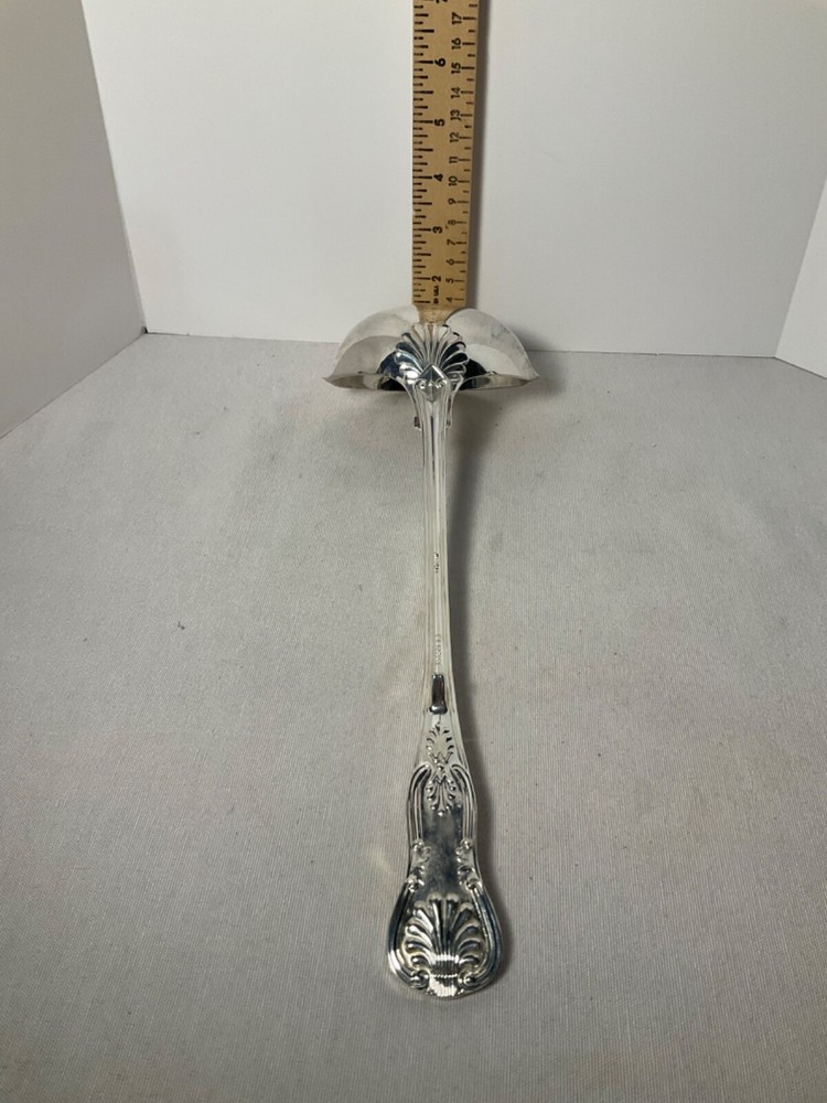 E B Rogers soup ladle silverplate attached rest 10”
