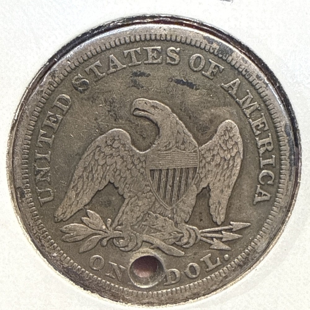 1846 Seated Liberty Dollar Holed.