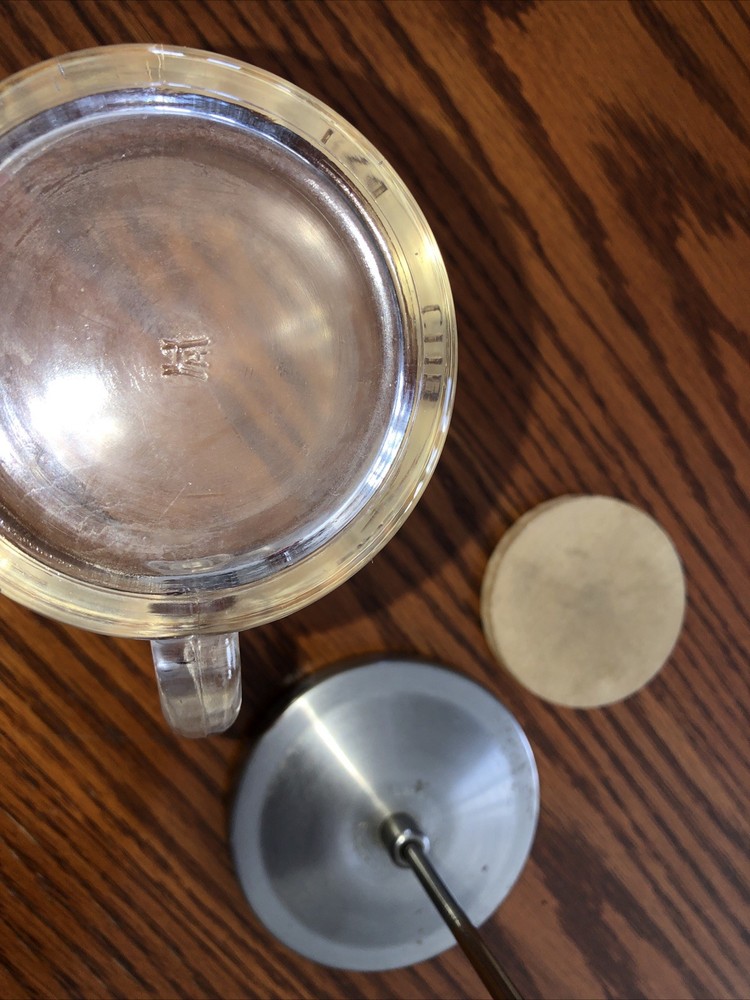 Vintage red handle measuring cup/chopper and two red handle utensils!