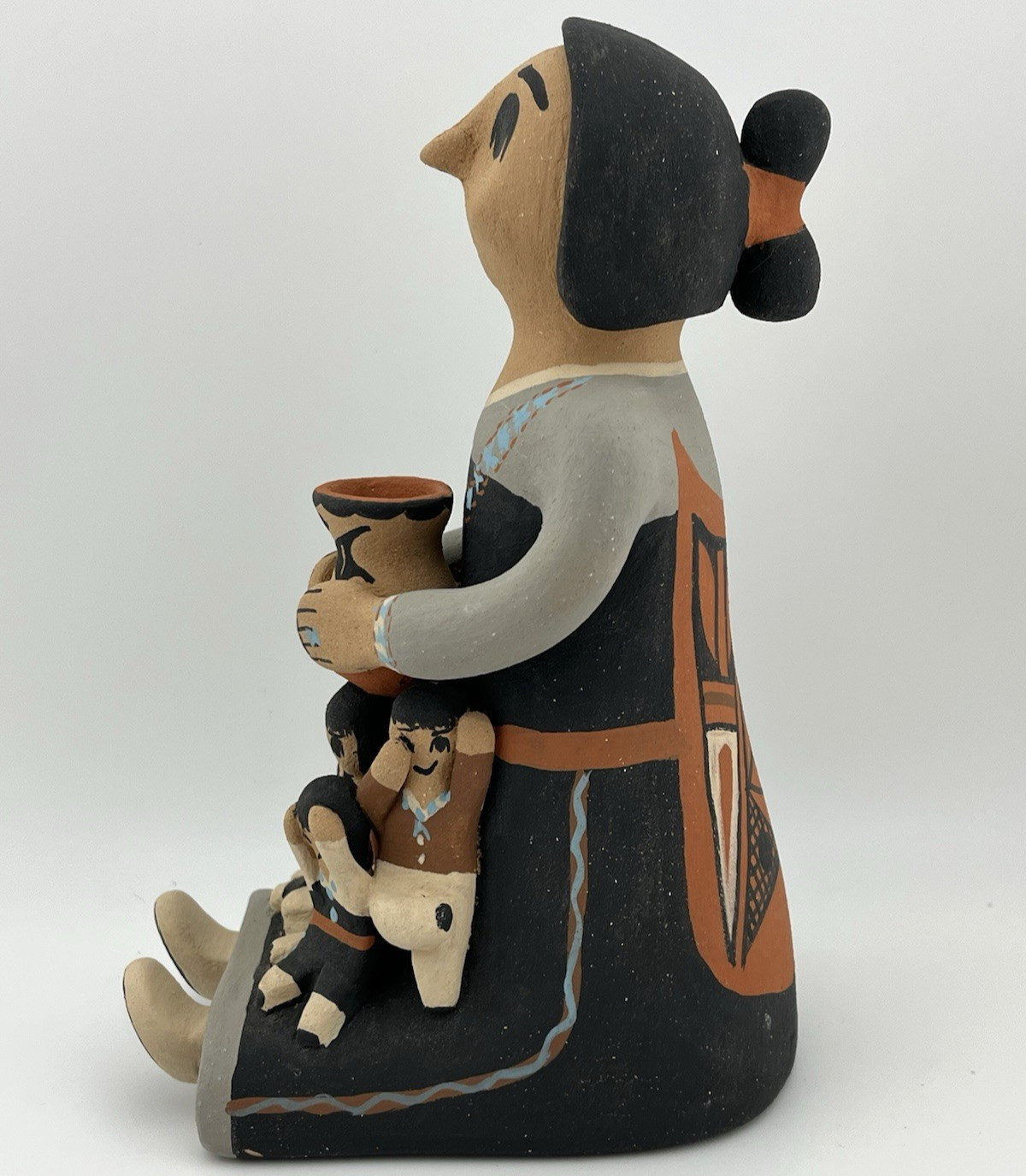 Jemez Pueblo Storyteller by Sabaquie – Southwest Native American