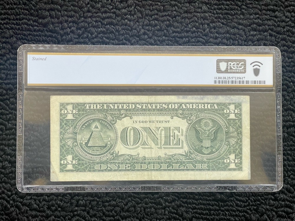 $1 2009 COPE PRINTING- STAINED PCGS 25
