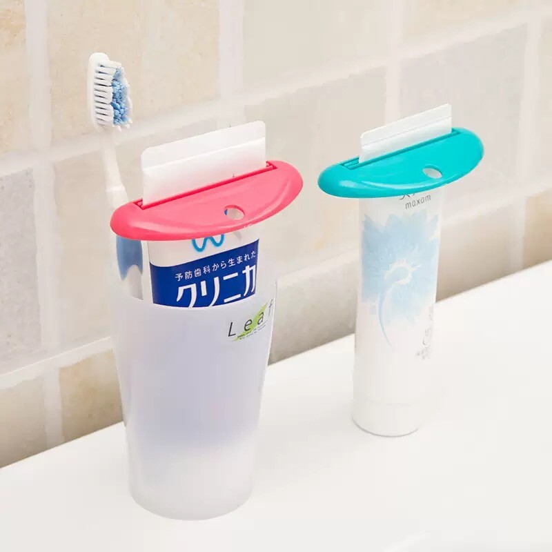 4X Plastic Tube Squeezer Toothpaste Dispenser Holder Rolling Bathroom Extract