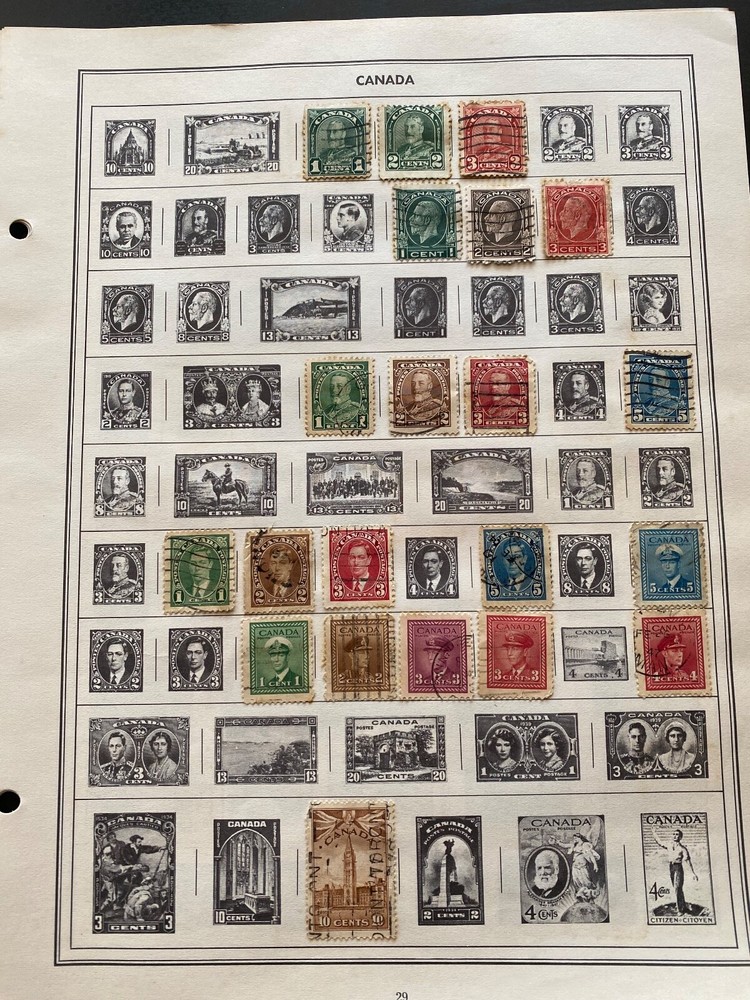 Worldwide Canada Stamps hinged on pages