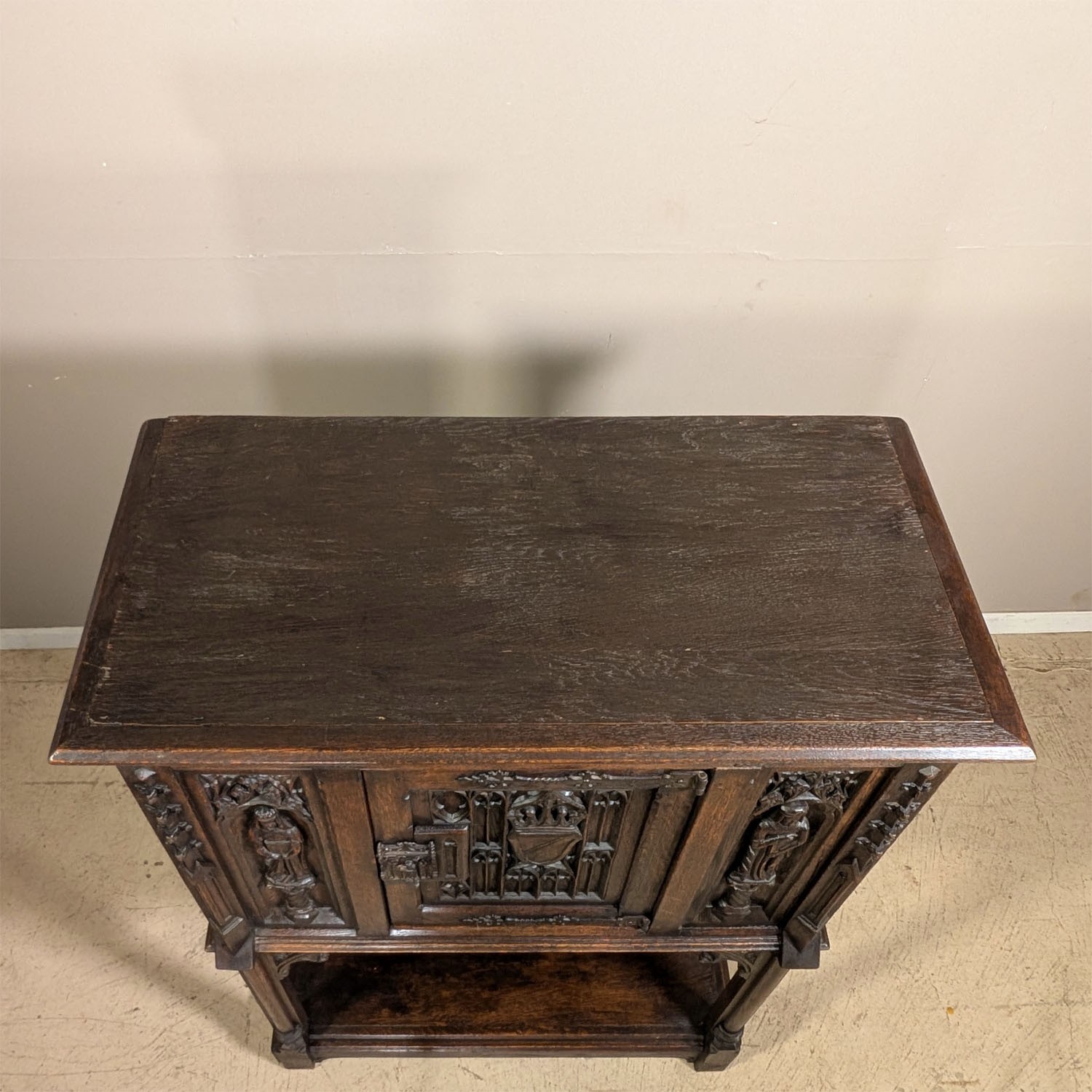 Antique French Gothic Carved Oak Cabinet Stand with Figural Panels Heraldic Door