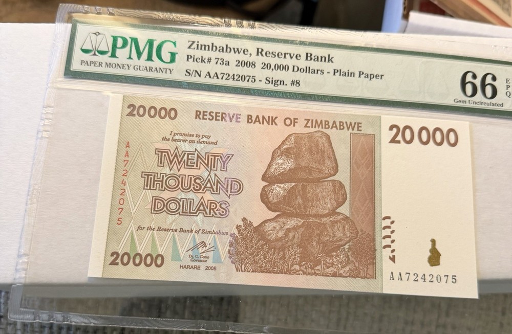 ✨ Zimbabwe 2008 20,000 Dollars — APMG Gem Uncirculated ✨